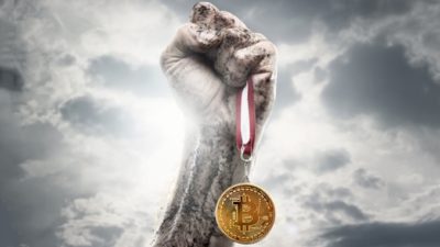 bitcoin madalyası kazanmış bir sporcu